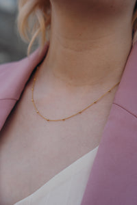 Gold bead necklace